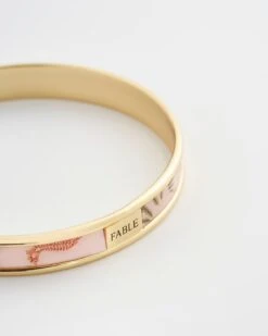 Whispering Sands Gold Plated Printed Bangle - Pink -Chic Accessories Shop whispering sands gold plated printed bangle pink by fable england 41228398756084
