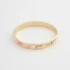 Whispering Sands Printed Gold Plated Bangle - Yellow -Chic Accessories Shop whispering sands printed gold plated bangle yellow by fable england 41228393480436